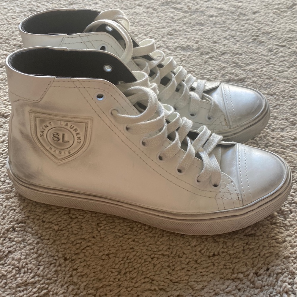 Distressed saint laurent high top sneakers in perfect condition.